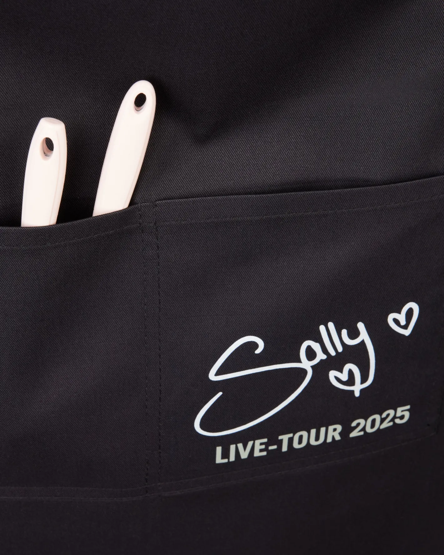 Sallys Live-Tour Schürze